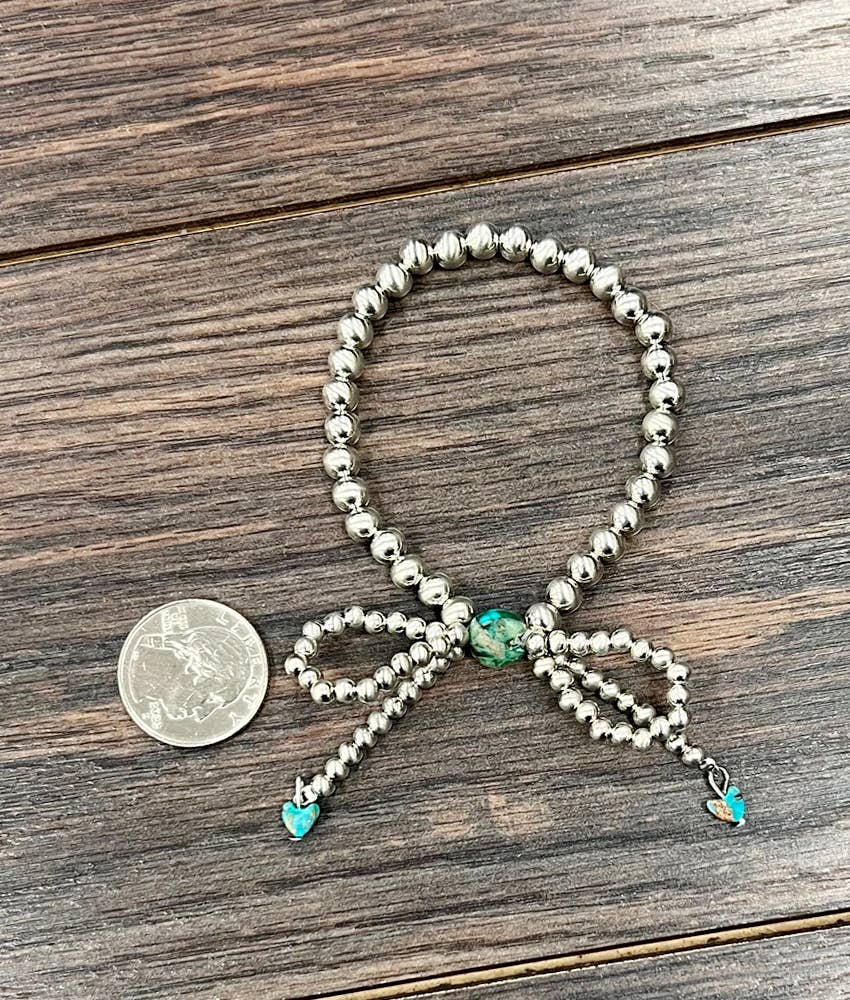 711640, Handmade Silver Navajo Bow Stretch Bracelet