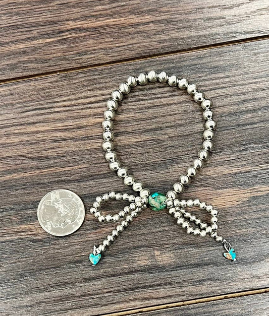 711640, Handmade Silver Navajo Bow Stretch Bracelet