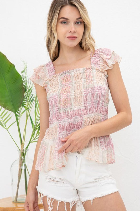 Tops Women’s Peplum top. 31387T