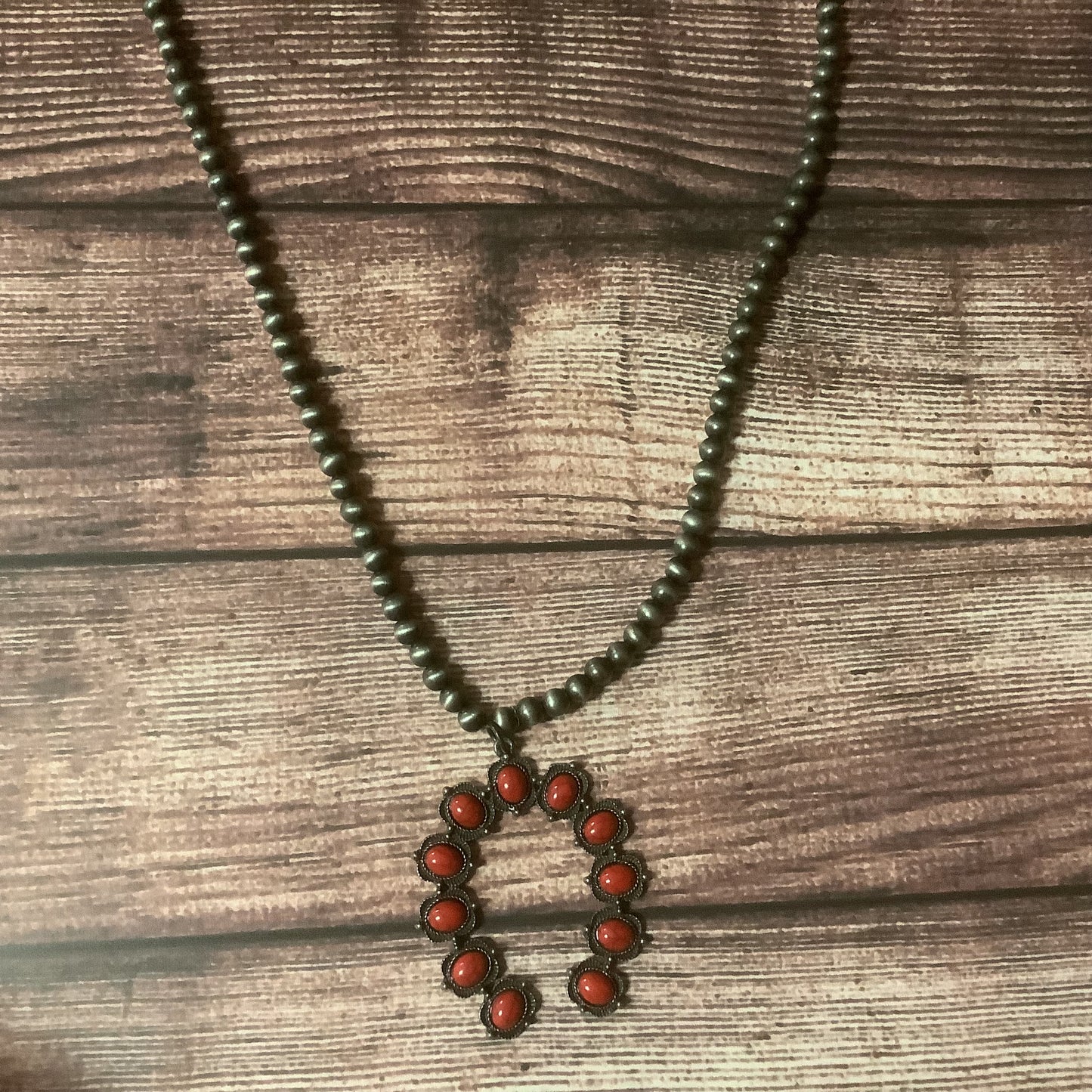 Globe bead necklace in bronze and silver