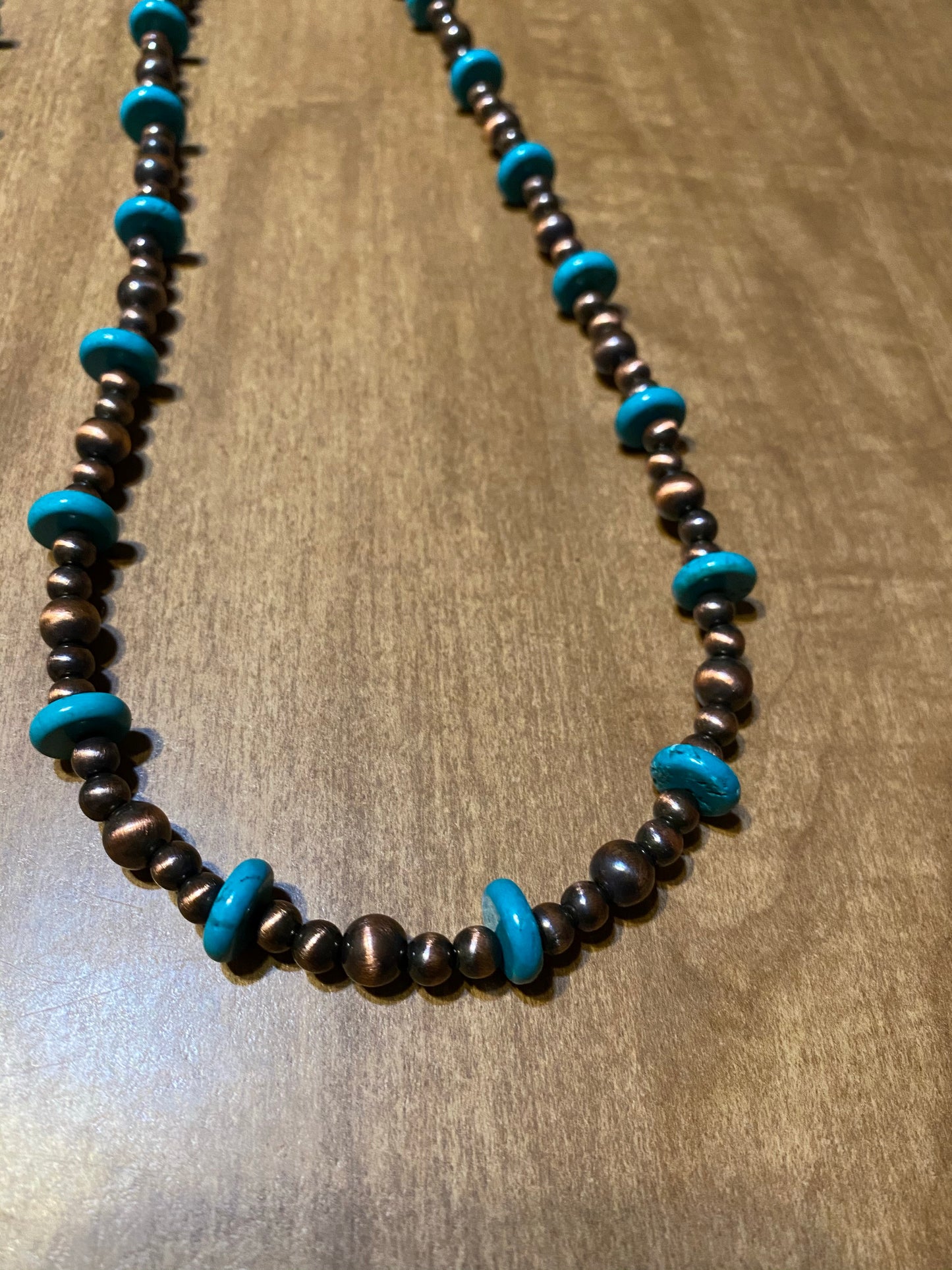 Necklaces turquoise and silver colored beads