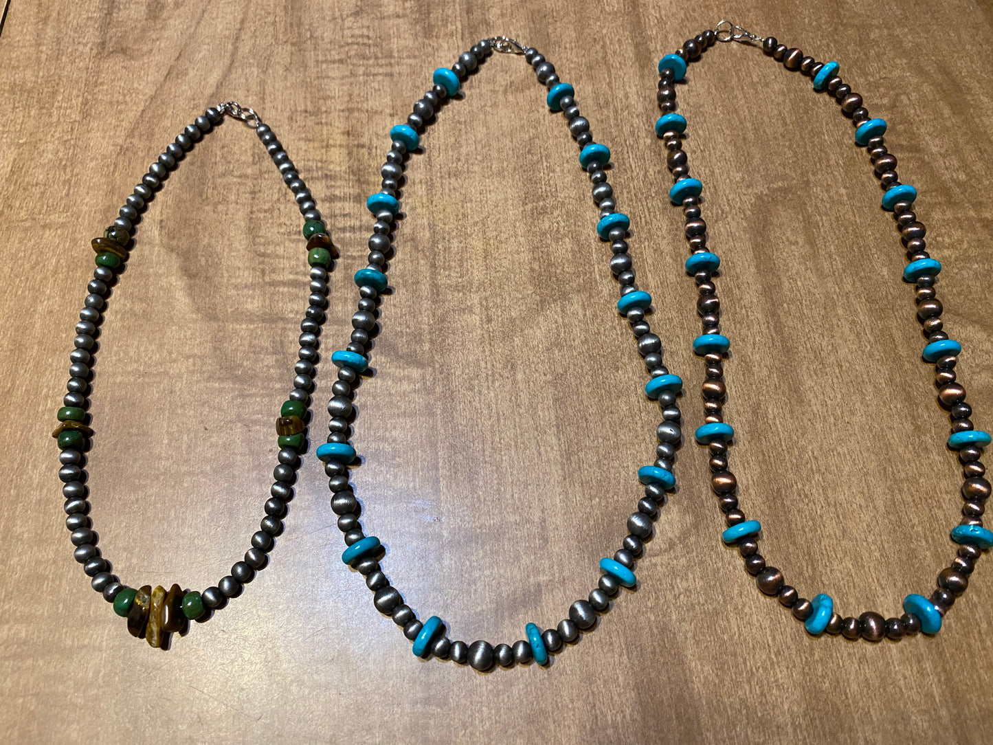 Necklaces turquoise and silver colored beads