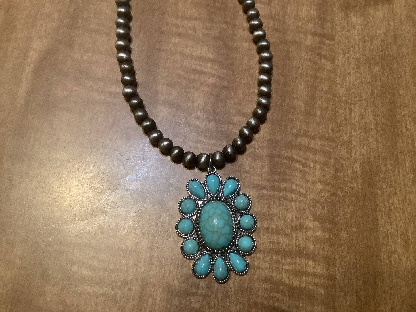 Globe bead necklace in bronze and silver