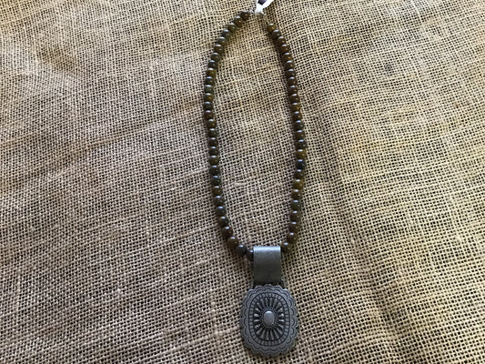 Choker necklace, turquoise and brown stone with concho accent.