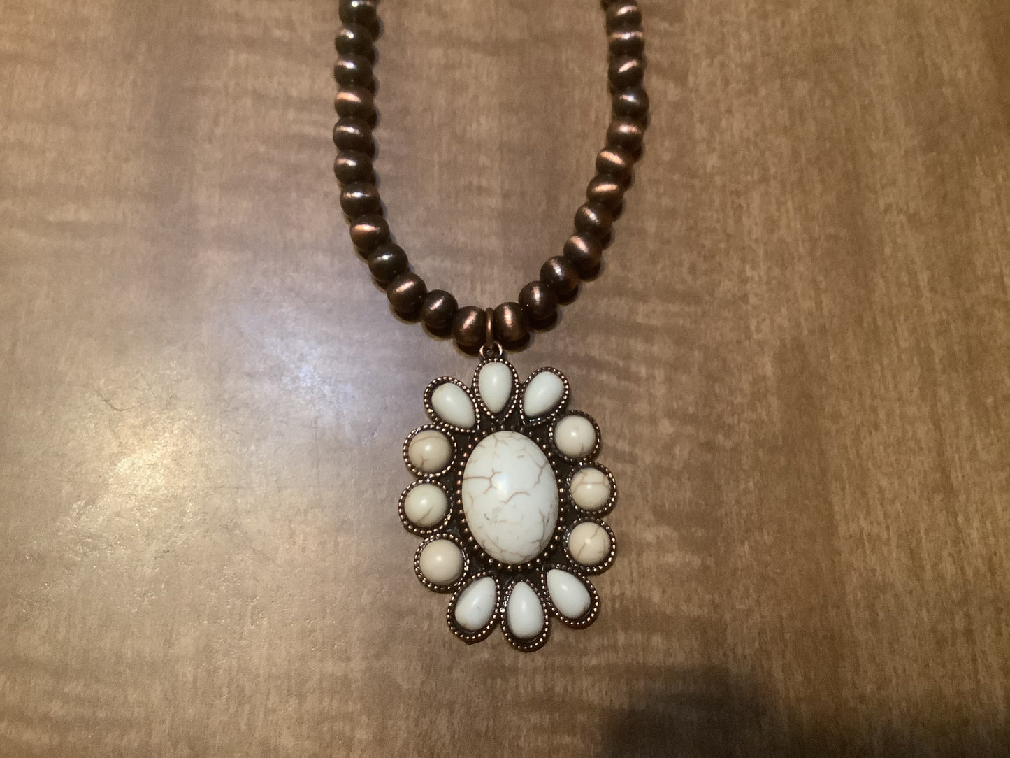 Globe bead necklace in bronze and silver