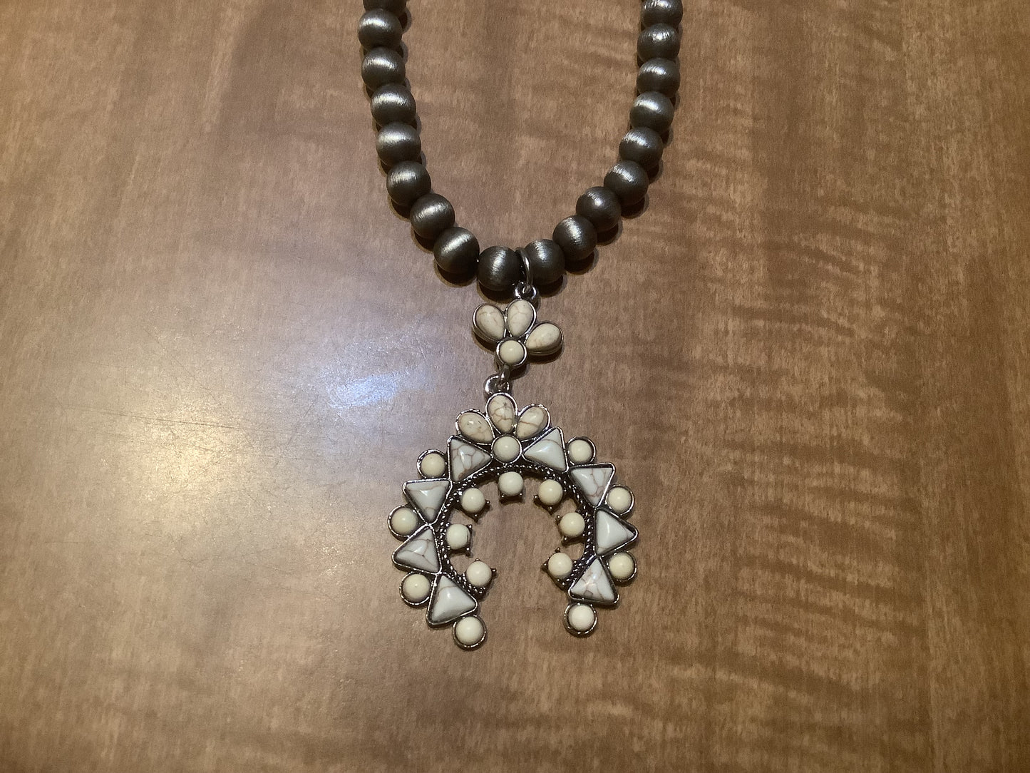 Globe bead necklace in bronze and silver