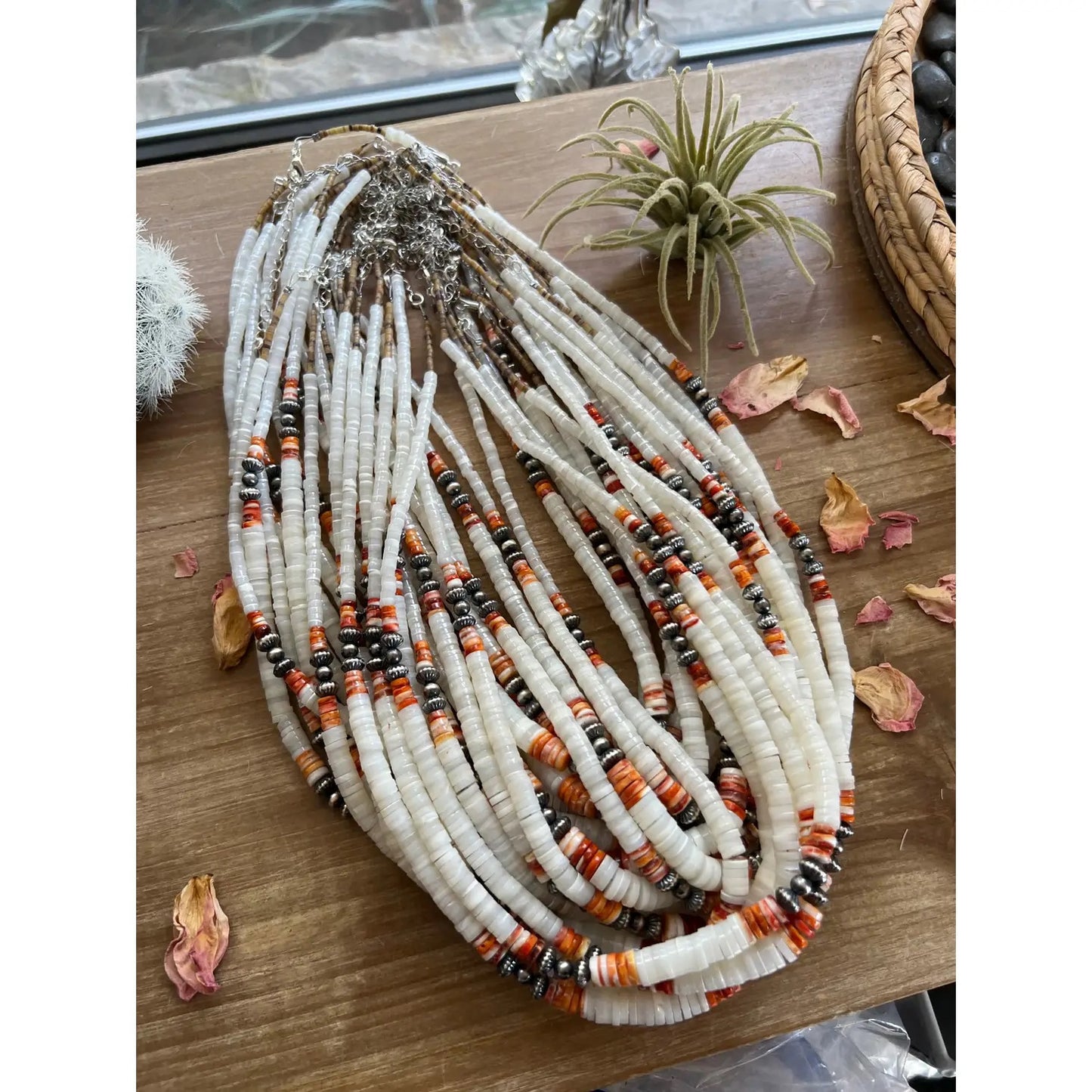 Graduated shell with Navajos; turquoise or spiny Necklace
