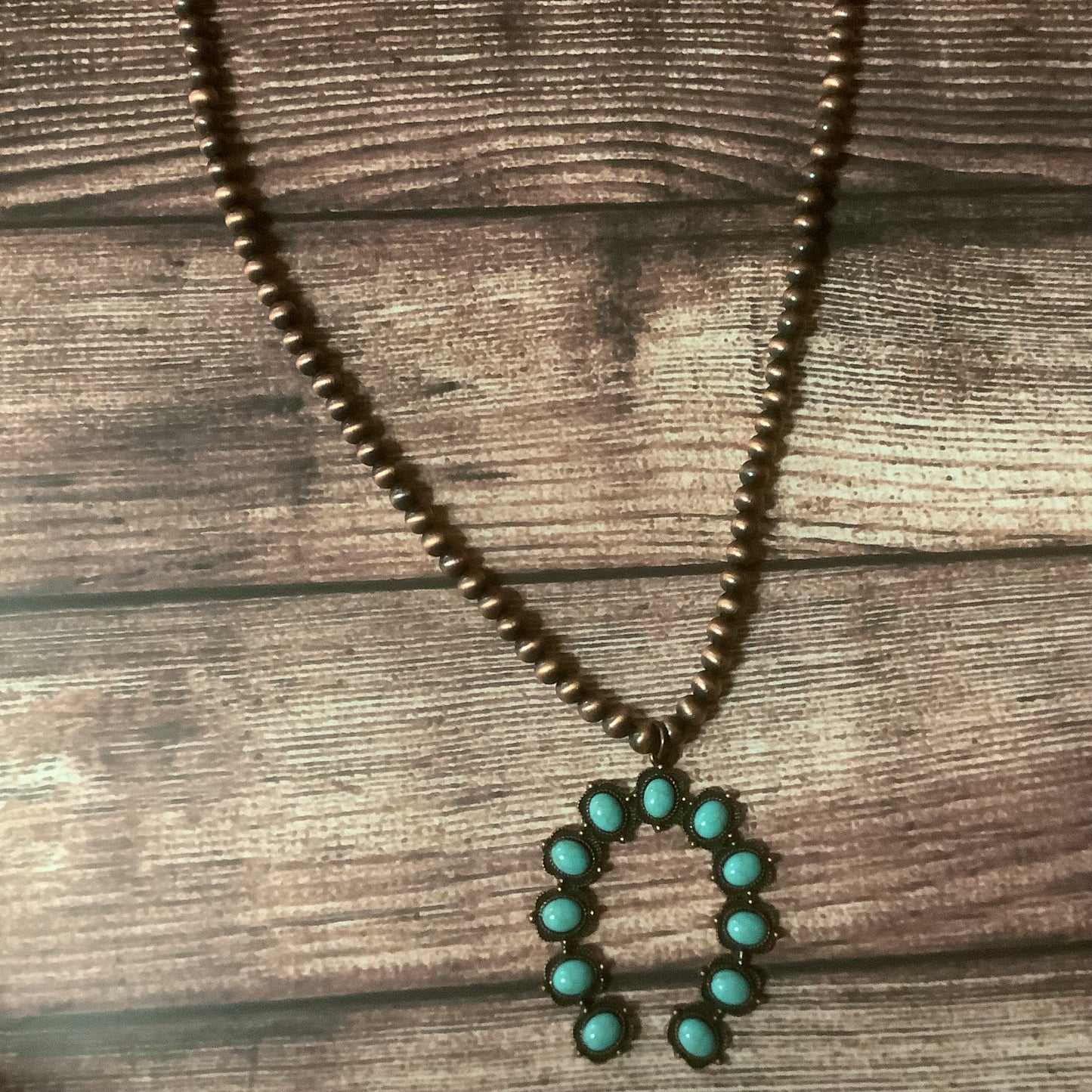 Globe bead necklace in bronze and silver