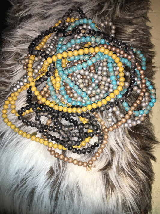 Teakwood bead necklace in 5 different colors.erw