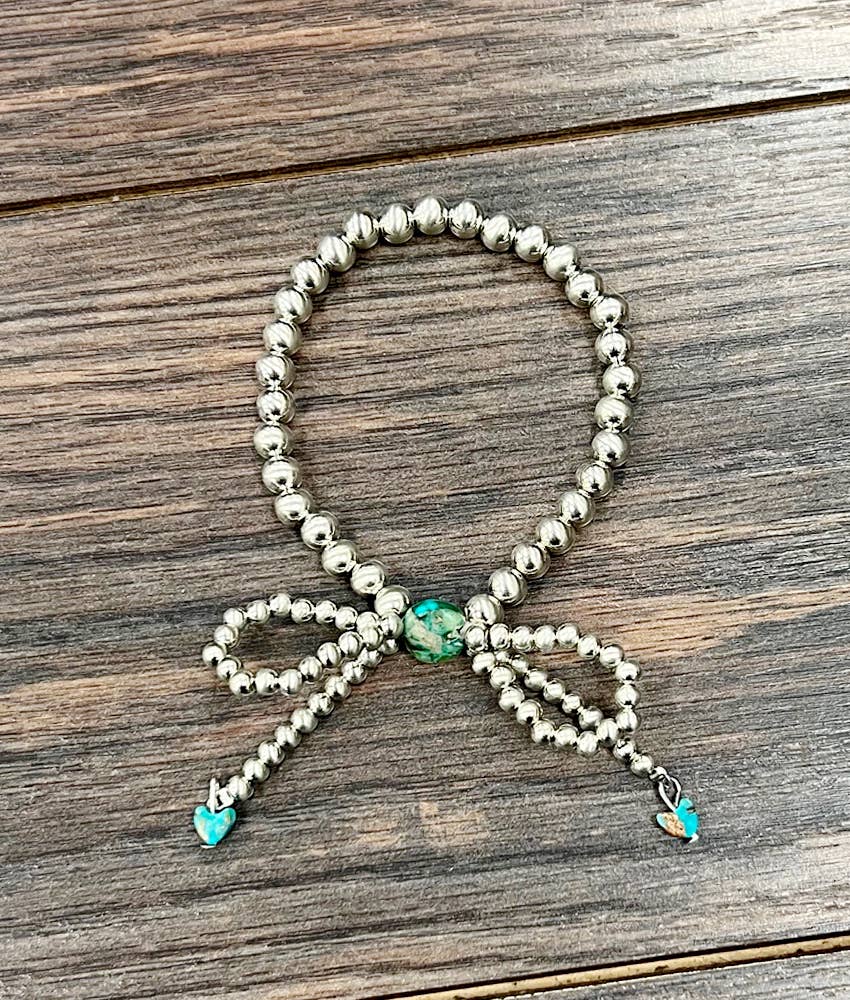 711640, Handmade Silver Navajo Bow Stretch Bracelet