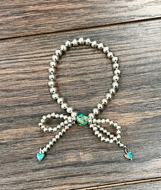 711640, Handmade Silver Navajo Bow Stretch Bracelet