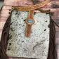 Large Hair on Cowhide Totebag with tooled leather strap belt and turquoise stone closure and dark brown fringe ADBGD102
