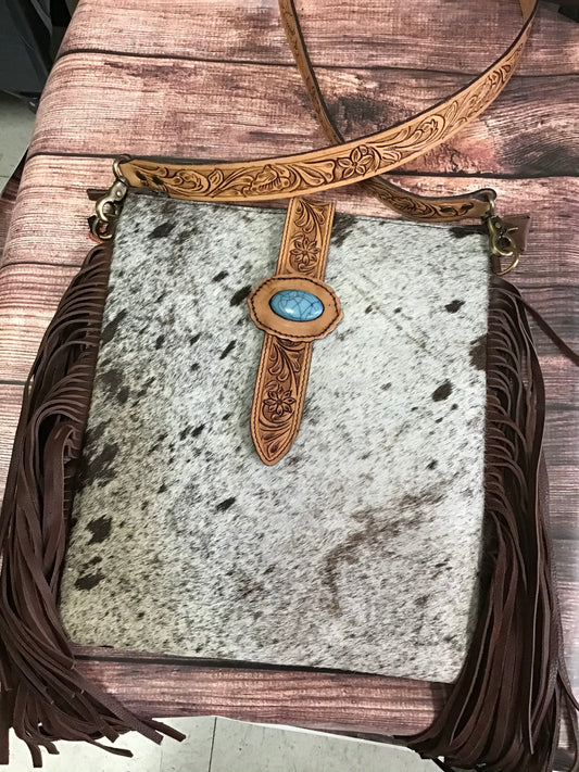 Large Hair on Cowhide Totebag with tooled leather strap belt and turquoise stone closure and dark brown fringe ADBGD102