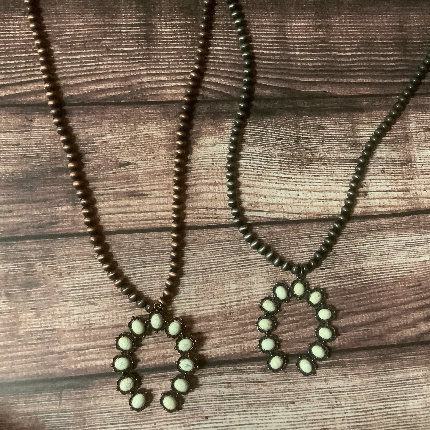 Globe bead necklace in bronze and silver