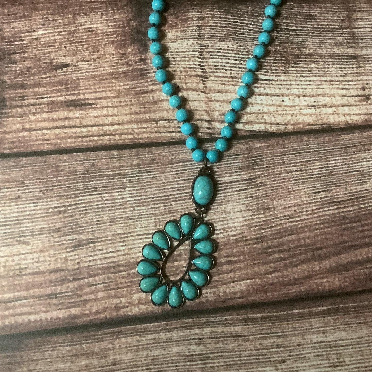 Turquoise bead teardrop bead necklace mid length